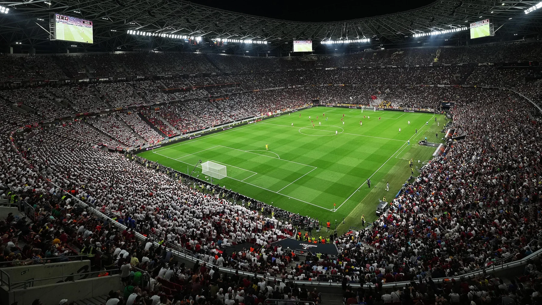 Supporters watching Sevilla play Roma in the 2023 Europa League final